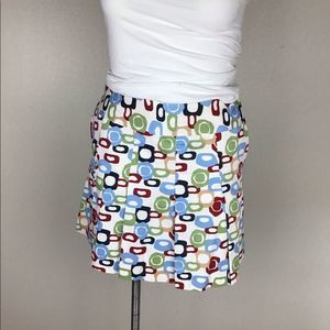 Liz golf skirt. Retro circle red black and white size 12.